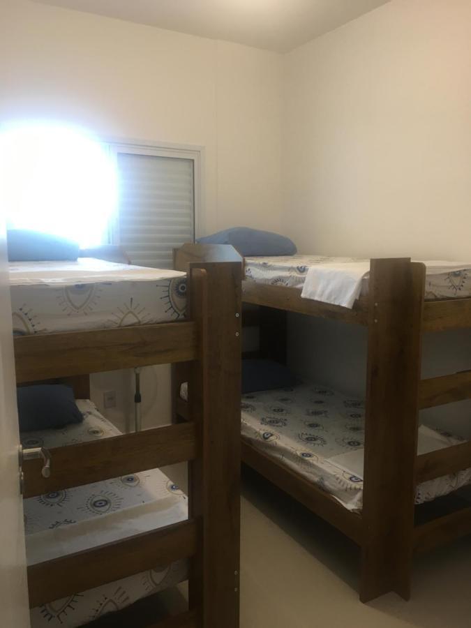 Apartamento Bertioga Torres Bagian luar foto