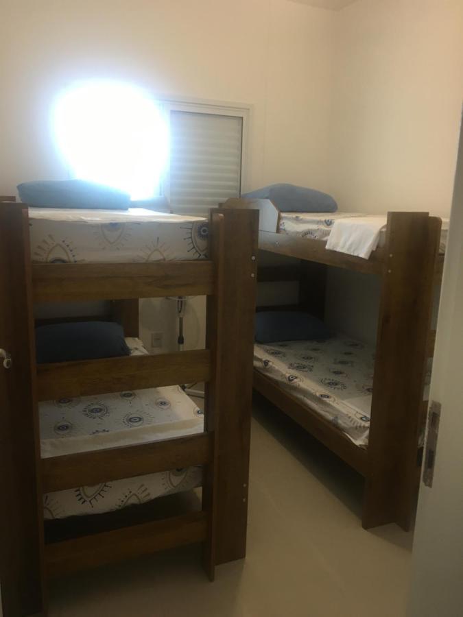 Apartamento Bertioga Torres Bagian luar foto